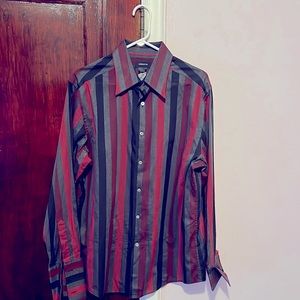 This is a long sleeve shirt design by Liz Claiborne. If you like style buy it.